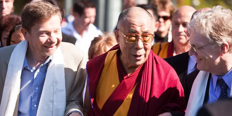 Eckhart Tolle (an inspirational speaker and writer) with the Dalai Lama and Ken Robinson
